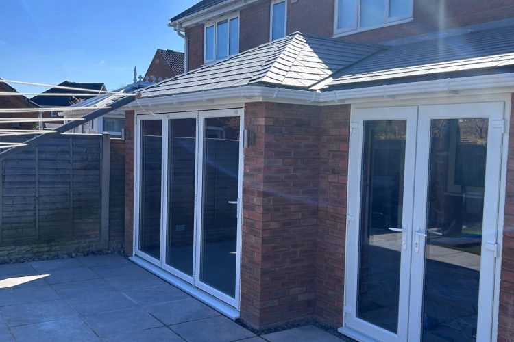 CONSERVATORY – WARM ROOF WITH NEW BI-FOLD AND FRENCH DOORS